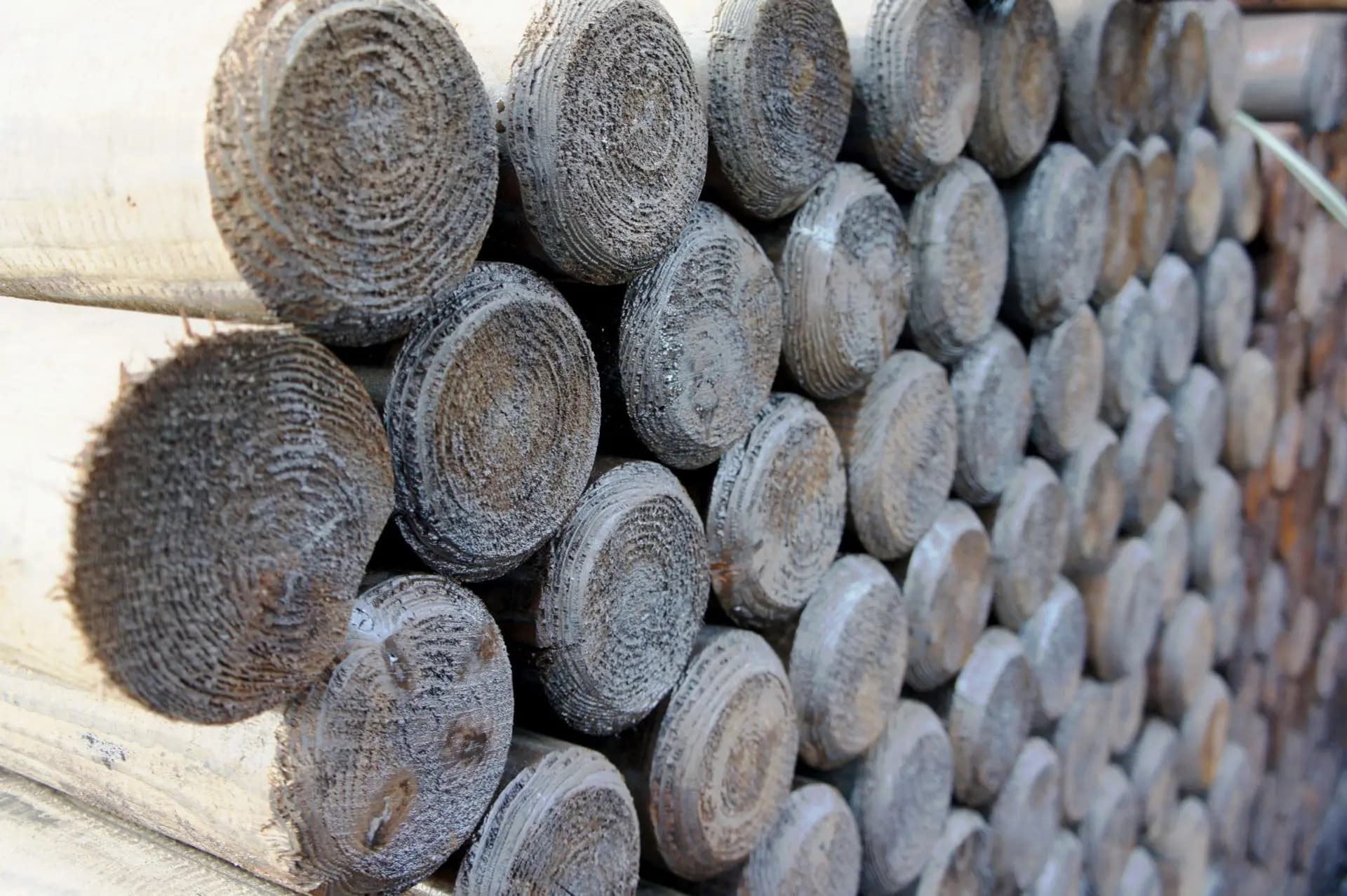 UK 100mm Creosoted Machined Round Post Pointed